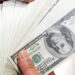 Dólar encosta em R$ 6 após Trump impor taxa de 104% à China